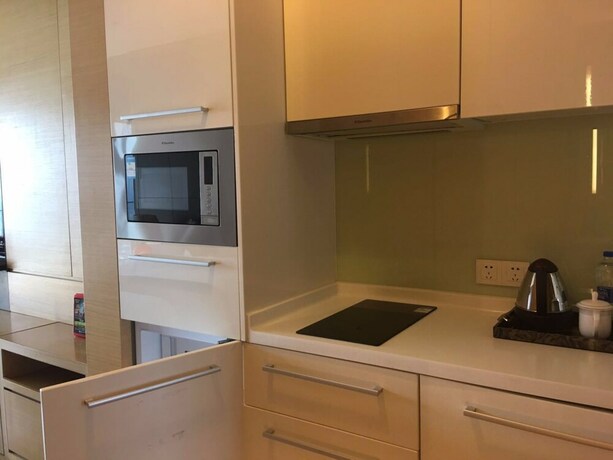 Imagen de la habitación del Hotel Checkinn Business Apartment-poly World. Foto 35