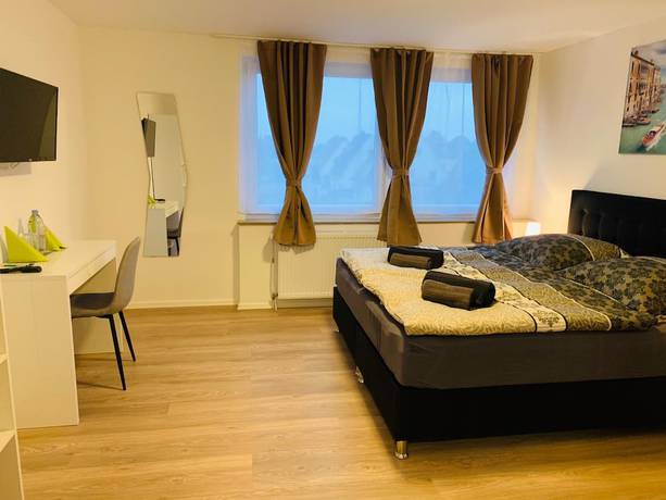 Imagen de la habitación del Hotel Checkinn. Foto 10