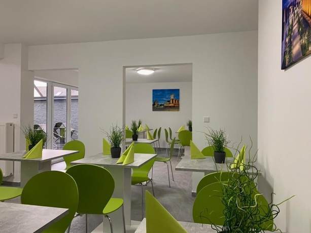 Imagen del bar/restaurante del Hotel Checkinn. Foto 4