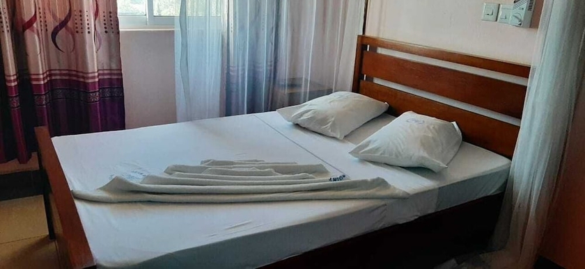 Imagen de la habitación del Hotel Checkpoint Inn. Foto 5