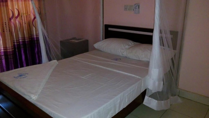 Imagen de la habitación del Hotel Checkpoint Inn. Foto 6