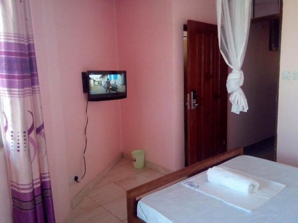 Imagen de la habitación del Hotel Checkpoint Inn. Foto 7