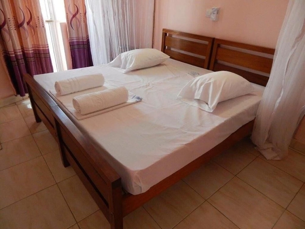 Imagen de la habitación del Hotel Checkpoint Inn. Foto 8