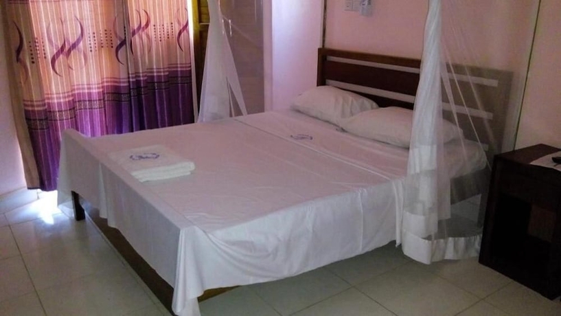 Imagen de la habitación del Hotel Checkpoint Inn. Foto 10