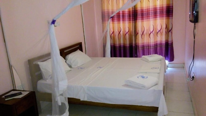 Imagen de la habitación del Hotel Checkpoint Inn. Foto 11
