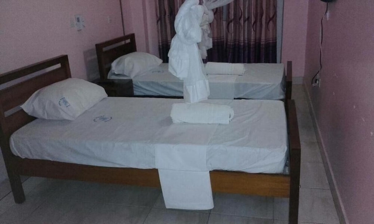 Imagen de la habitación del Hotel Checkpoint Inn. Foto 12