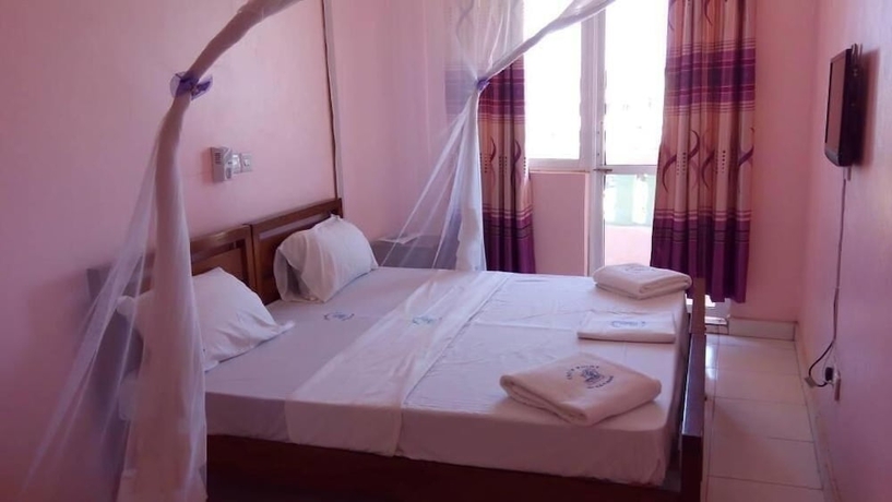 Imagen de la habitación del Hotel Checkpoint Inn. Foto 14