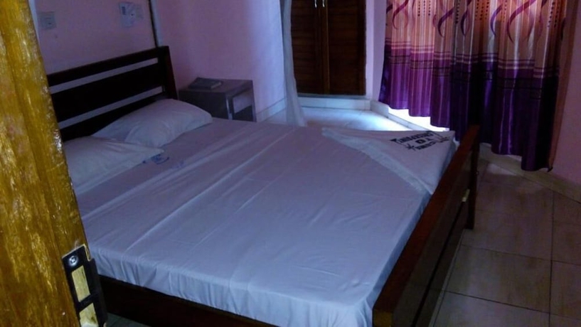 Imagen de la habitación del Hotel Checkpoint Inn. Foto 16