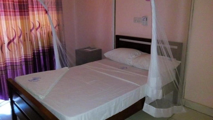 Imagen de la habitación del Hotel Checkpoint Inn. Foto 18