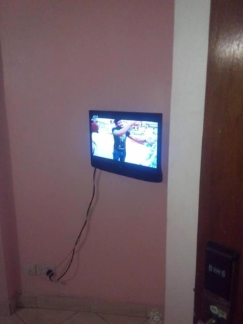 Imagen de la habitación del Hotel Checkpoint Inn. Foto 19