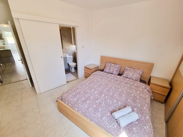 Imagen de la habitación del Hotel Cheer Up City Apartment. Foto 3