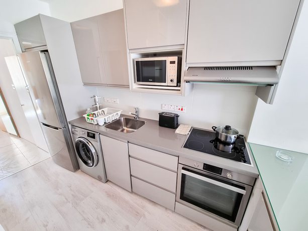 Imagen de la habitación del Hotel Cheer Up City Apartment. Foto 4