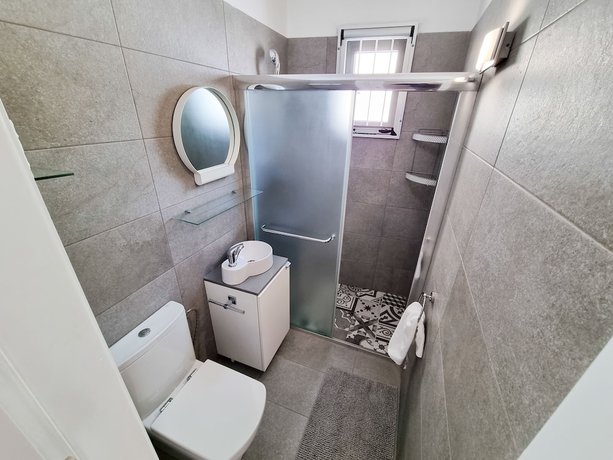 Imagen de la habitación del Hotel Cheer Up City Apartment. Foto 5