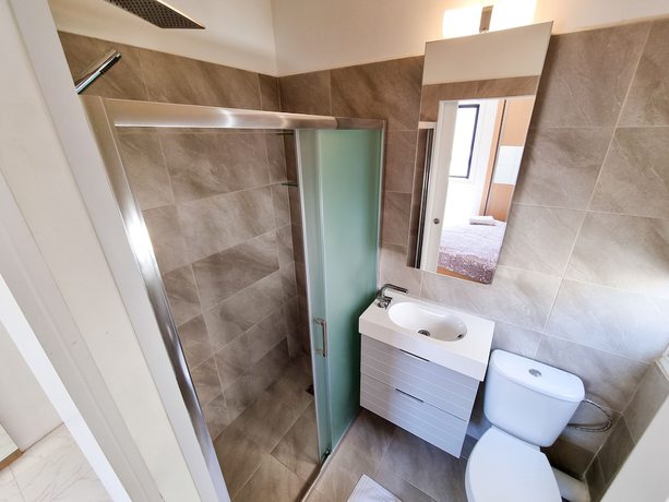 Imagen de la habitación del Hotel Cheer Up City Apartment. Foto 6
