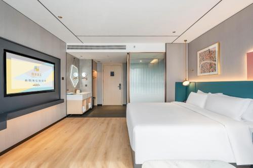 Imagen de la habitación del Hotel CheerMay - Beijing Conference Center. Foto 18