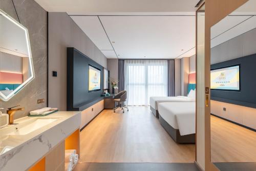 Imagen de la habitación del Hotel CheerMay - Beijing Conference Center. Foto 20