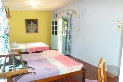 Imagen de la habitación del Hotel Cheers Garden Chalet. Foto 16