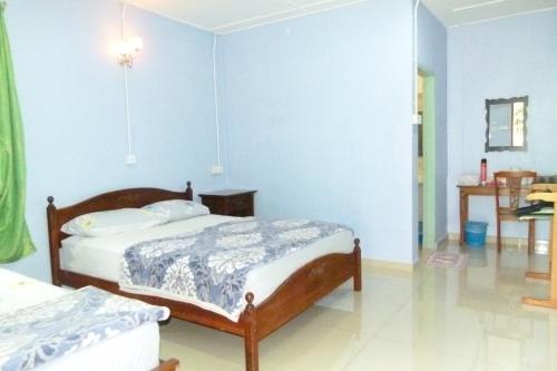 Imagen de la habitación del Hotel Cheers Garden Chalet. Foto 18