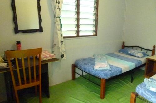 Imagen de la habitación del Hotel Cheers Garden Chalet. Foto 20