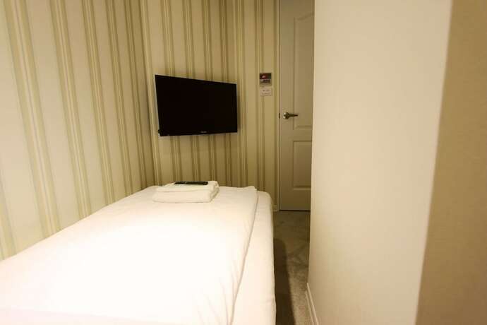 Imagen de la habitación del Hotel Cheers Loft. Foto 13