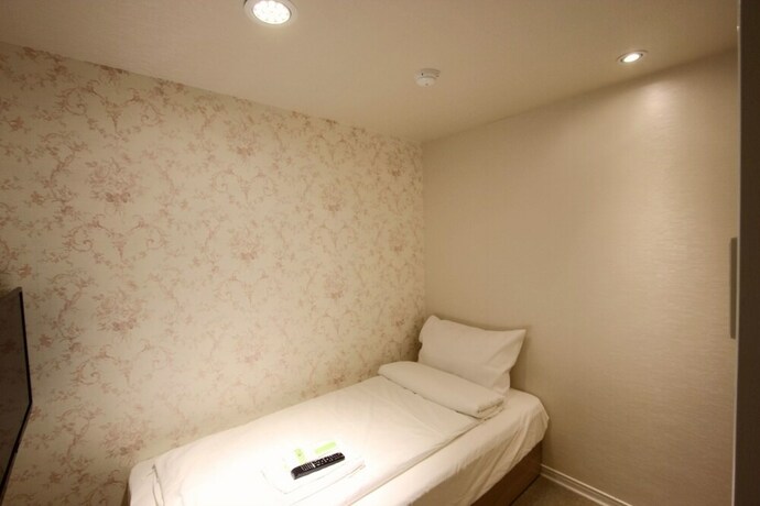 Imagen de la habitación del Hotel Cheers Loft. Foto 18