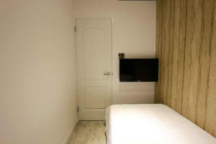 Imagen de la habitación del Hotel Cheers Loft. Foto 21
