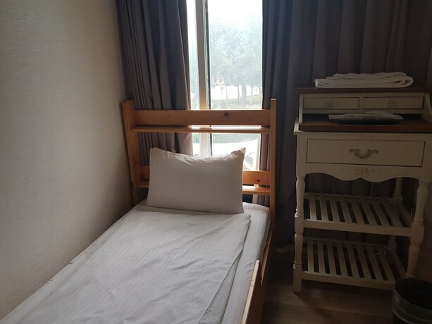 Imagen de la habitación del Hotel Cheers Loft. Foto 27