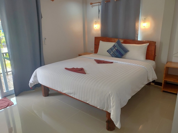 Imagen de la habitación del Hotel Cheeva Beach Resort. Foto 11