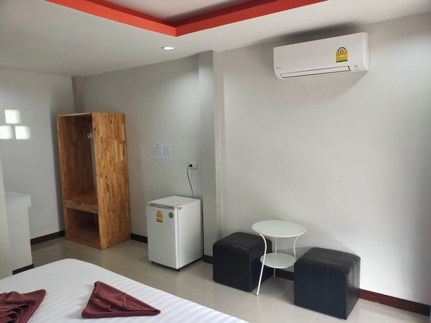 Imagen de la habitación del Hotel Cheeva Beach Resort. Foto 12