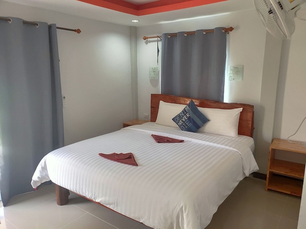 Imagen de la habitación del Hotel Cheeva Beach Resort. Foto 14