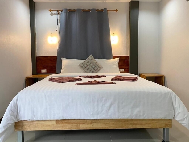 Imagen de la habitación del Hotel Cheeva Beach Resort. Foto 15