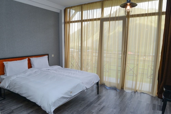 Imagen de la habitación del Hotel Chemodann Kazbegi. Foto 17