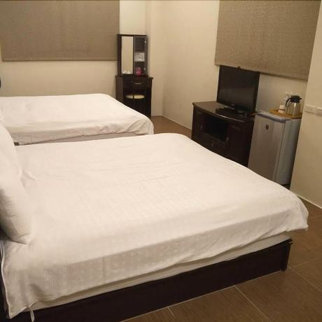 Imagen de la habitación del Hotel Chen Yi. Foto 13