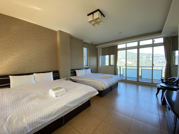 Imagen de la habitación del Hotel Chen Yi. Foto 19