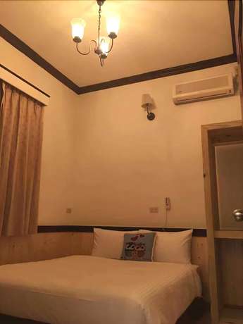 Imagen de la habitación del Hotel Cheng Lan. Foto 15