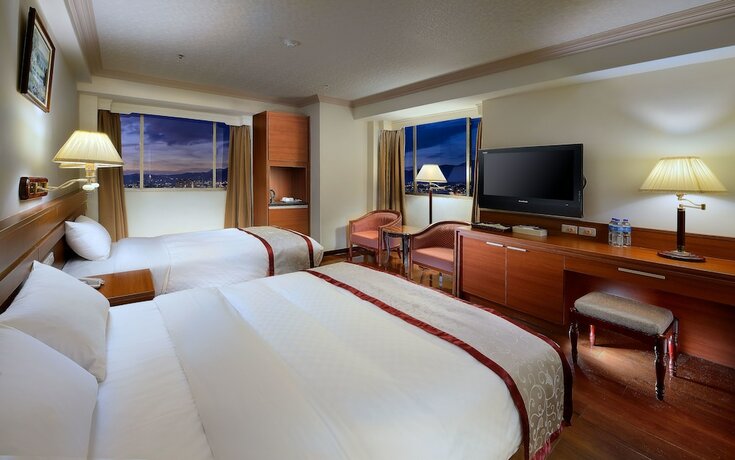 Imagen de la habitación del Hotel Cheng Pao. Foto 12