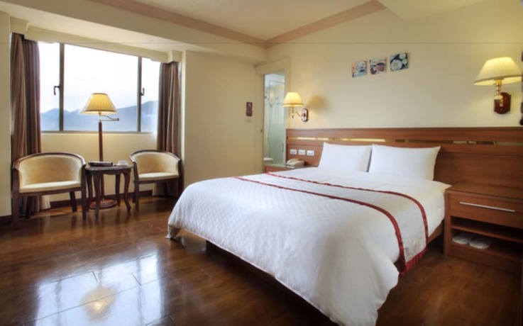 Imagen de la habitación del Hotel Cheng Pao. Foto 15