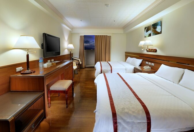 Imagen de la habitación del Hotel Cheng Pao. Foto 17