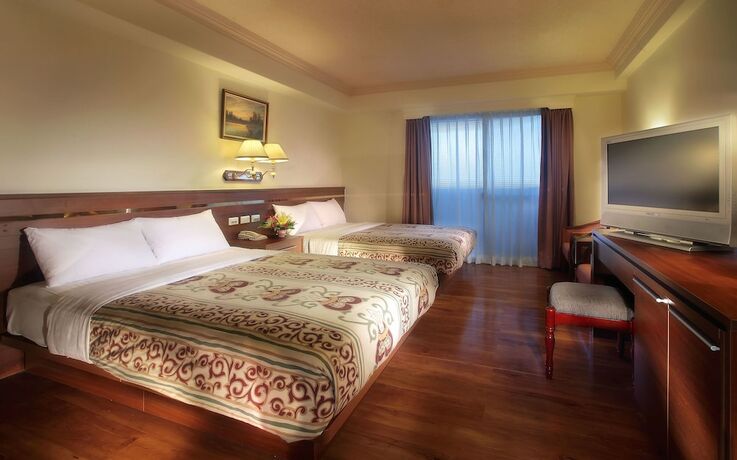 Imagen de la habitación del Hotel Cheng Pao. Foto 20