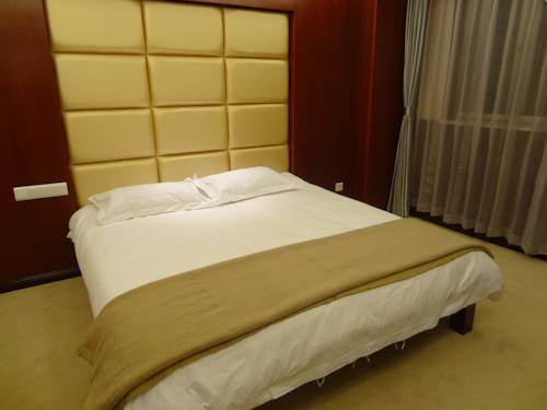 Imagen de la habitación del Hotel Chengde Huilong Tower. Foto 7