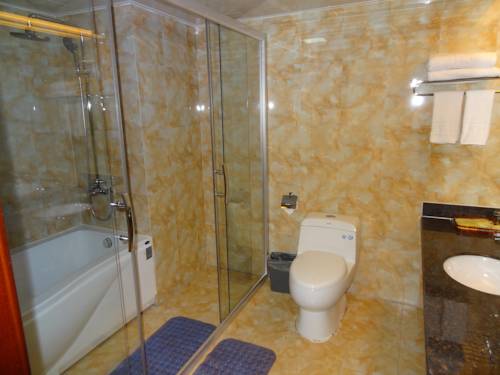 Imagen de la habitación del Hotel Chengde Huilong Tower. Foto 8