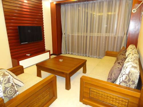 Imagen de la habitación del Hotel Chengde Huilong Tower. Foto 9