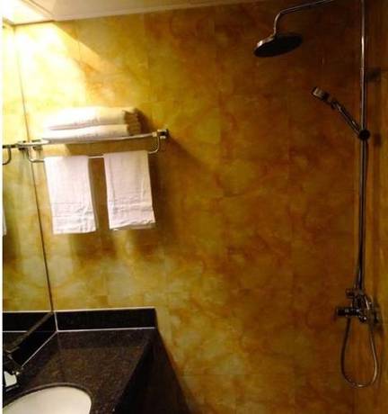 Imagen de la habitación del Hotel Chengde Huilong Tower. Foto 12