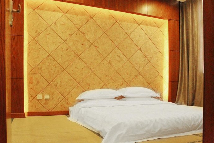 Imagen de la habitación del Hotel Chengde No.1 Business Hotel. Foto 17