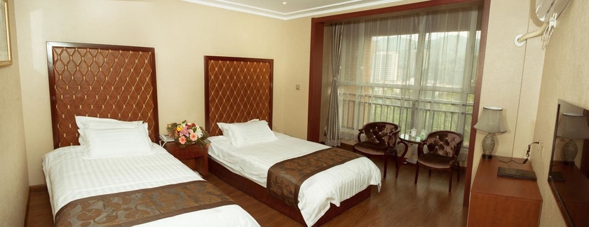 Imagen de la habitación del Hotel Chengde Shengyi Business. Foto 2