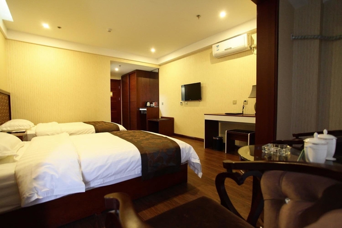 Imagen de la habitación del Hotel Chengde Shengyi Business. Foto 4