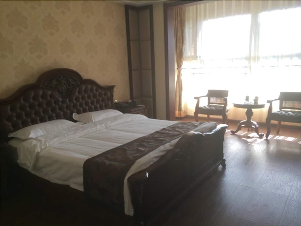 Imagen de la habitación del Hotel Chengde Shengyi Business. Foto 6