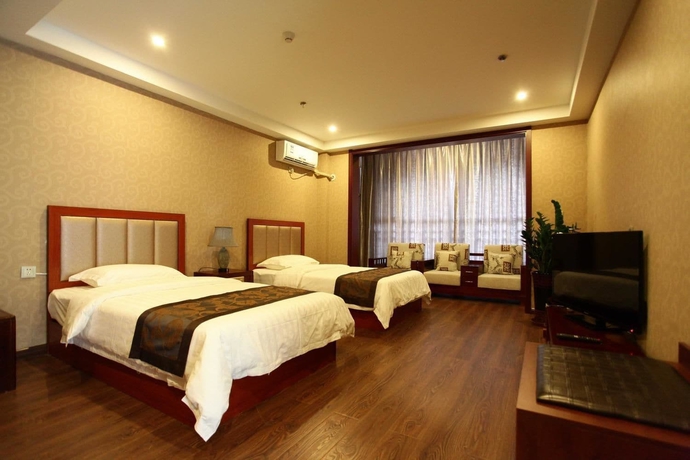 Imagen de la habitación del Hotel Chengde Shengyi Business. Foto 7