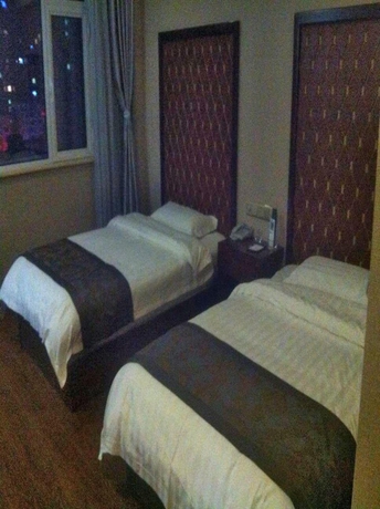 Imagen de la habitación del Hotel Chengde Shengyi Business. Foto 8