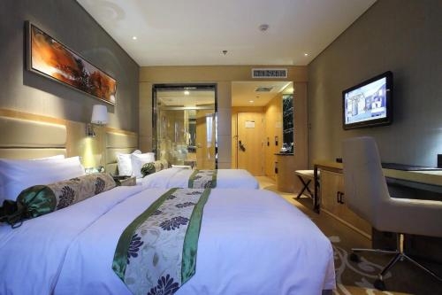 Imagen de la habitación del Hotel Chengde Ziyu International Holiday. Foto 6